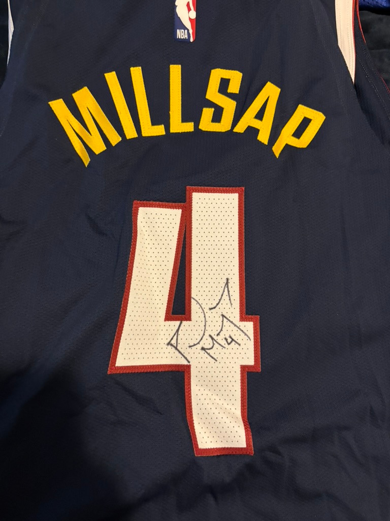 Millsap number 4 dark basketball jersey from Matt’s collection, with original inscriptions.